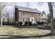 Beautiful two-story brick home with classic architectural details and mature landscaping at 805 Joshua Clay Dr, Rocky Mount, NC 27803
