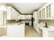 Kitchen boasts ample cabinetry, stainless steel appliances, and an island at 805 Joshua Clay Dr, Rocky Mount, NC 27803