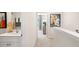 Bright hallway with a view into a bedroom and bathroom at 8638 Brixton Shay Dr, Raleigh, NC 27616