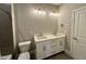 Bathroom with a double vanity, providing ample space and storage at 90 Firefly Ln, Louisburg, NC 27549