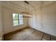 Bright dining room with decorative molding and a modern chandelier, perfect for entertaining guests at 90 Firefly Ln, Louisburg, NC 27549