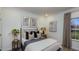 Serene bedroom with a double bed and a view of the backyard at 912 Thimbleweed Way, Wake Forest, NC 27587