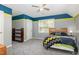 Bedroom with wood shelving and ceiling fan at 100 Bridgham Pl, Clayton, NC 27527