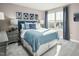 Serene bedroom with a blue bedding set and star decor at 1008 Country Pasture Cv, Wendell, NC 27591