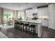 Spacious kitchen with white cabinets, granite countertops, and a large island at 1008 Country Pasture Cv, Wendell, NC 27591