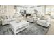 Bright living room with comfortable seating and a large area rug at 1008 Country Pasture Cv, Wendell, NC 27591