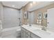 Clean bathroom with double vanity, tub, and shower at 1020 Country Pasture Cv, Wendell, NC 27591