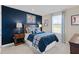 Cozy bedroom with a baseball-themed decor and ample closet space at 1020 Country Pasture Cv, Wendell, NC 27591