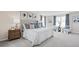 Spacious main bedroom with large bed, sitting area, and ample natural light at 1020 Country Pasture Cv, Wendell, NC 27591