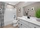 Functional bathroom with a shower-tub combination, white vanity, and modern fixtures at 1024 Country Pasture Cv, Wendell, NC 27591