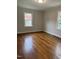 Spacious bedroom with hardwood floors and lots of natural light at 106 Joy St, Dunn, NC 28334