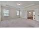 Bright bedroom featuring hardwood floors and ample natural light at 106 Park Manor Ln, Cary, NC 27519