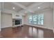 Gathering room with fireplace and coffered ceiling at 106 Park Manor Ln, Cary, NC 27519
