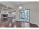 Gathering room with fireplace and sliding glass door to patio at 106 Park Manor Ln, Cary, NC 27519