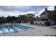 Community pool with lounge chairs and clubhouse at 106 Park Manor Ln, Cary, NC 27519