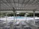 Relaxing pool area with shaded seating and lounge chairs at 106 Park Manor Ln, Cary, NC 27519