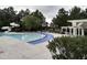 Inviting community pool with a waterslide and ample deck space at 106 Park Manor Ln, Cary, NC 27519