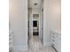 Elegant bathroom hallway with tile flooring and luxurious features at 120 Crosby Ln, Sanford, NC 27330