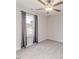 Bedroom featuring neutral carpet, ceiling fan and a window with gray drapes at 120 Crosby Ln, Sanford, NC 27330