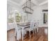 Charming dining room with large windows, modern lighting, and coffered ceiling at 120 Crosby Ln, Sanford, NC 27330