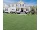 Charming two-story home with landscaped yard and inviting front porch at 120 Crosby Ln, Sanford, NC 27330
