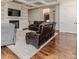 Inviting living room features a fireplace, built-in shelving, and hardwood flooring at 120 Crosby Ln, Sanford, NC 27330
