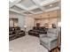 Open-concept living room with coffered ceiling and seamless flow to the kitchen at 120 Crosby Ln, Sanford, NC 27330