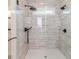 Modern shower showcasing neutral tile, dual shower heads, and a window at 120 Crosby Ln, Sanford, NC 27330