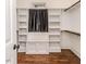 Walk-in closet showcasing shelving and a window with bench at 120 Crosby Ln, Sanford, NC 27330
