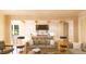 Open concept kitchen and living area with modern appliances and island at 1521 Canterbury Rd, Raleigh, NC 27608