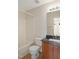 Bathroom with tub, toilet, and granite vanity at 1673 Snowmass Way, Durham, NC 27713