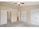 Large bedroom with carpet, multiple closets and en-suite bathroom access at 1673 Snowmass Way, Durham, NC 27713