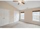 Well-lit bedroom with carpet, double closets and two windows at 1673 Snowmass Way, Durham, NC 27713