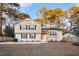 Two-story house with newly painted exterior and landscaped yard at 20 Lynn Road Rd, Raleigh, NC 27609