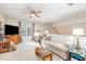 Spacious bonus room with comfortable seating and large TV at 2112 White Pond Ct, Apex, NC 27523