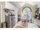 Sunny kitchen nook featuring a large window, a dining table, and ample cabinet space at 2112 White Pond Ct, Apex, NC 27523