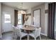 Bright dining room with wood table and neutral decor at 248 Broomside Ave, Raleigh, NC 27603