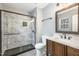 Modern bathroom with a large walk-in shower and a vanity at 2862 Filbert St, Raleigh, NC 27610