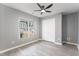 Spacious bedroom featuring a double door closet and large window at 2862 Filbert St, Raleigh, NC 27610