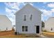 Gray house exterior with black door and small patio at 2862 Filbert St, Raleigh, NC 27610