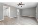Spacious living room with gray walls and wood-look flooring at 2862 Filbert St, Raleigh, NC 27610