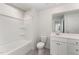 Clean bathroom, featuring a shower/tub combo, toilet and vanity with storage at 339 Suhani Ln, Clayton, NC 27520
