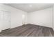 Spacious bedroom with wood-look flooring and en-suite bathroom at 339 Suhani Ln, Clayton, NC 27520