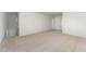 Upstairs bedroom with carpeted floor and view at 339 Suhani Ln, Clayton, NC 27520