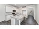 Modern kitchen with white cabinets, granite countertops and stainless steel appliances at 339 Suhani Ln, Clayton, NC 27520