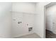 Convenient laundry room with built-in shelving and hookups at 339 Suhani Ln, Clayton, NC 27520