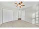 Bedroom with double doors leading to a closet and additional room at 3727 Votive Ln, Raleigh, NC 27604