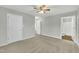 Spacious bedroom with ceiling fan and ensuite bathroom at 3727 Votive Ln, Raleigh, NC 27604
