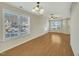 Dining area with hardwood floors and a view of the front yard at 3727 Votive Ln, Raleigh, NC 27604
