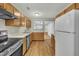 Kitchen with stainless steel appliances and wood cabinets at 3727 Votive Ln, Raleigh, NC 27604